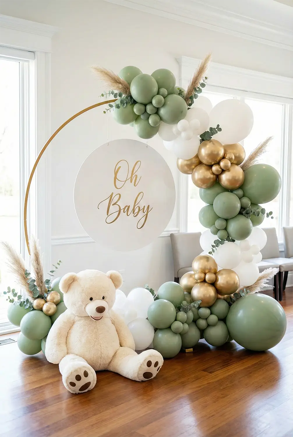 Luxury Baby Shower Backdrop with gold arch, sage balloons and 'Oh Baby' sign